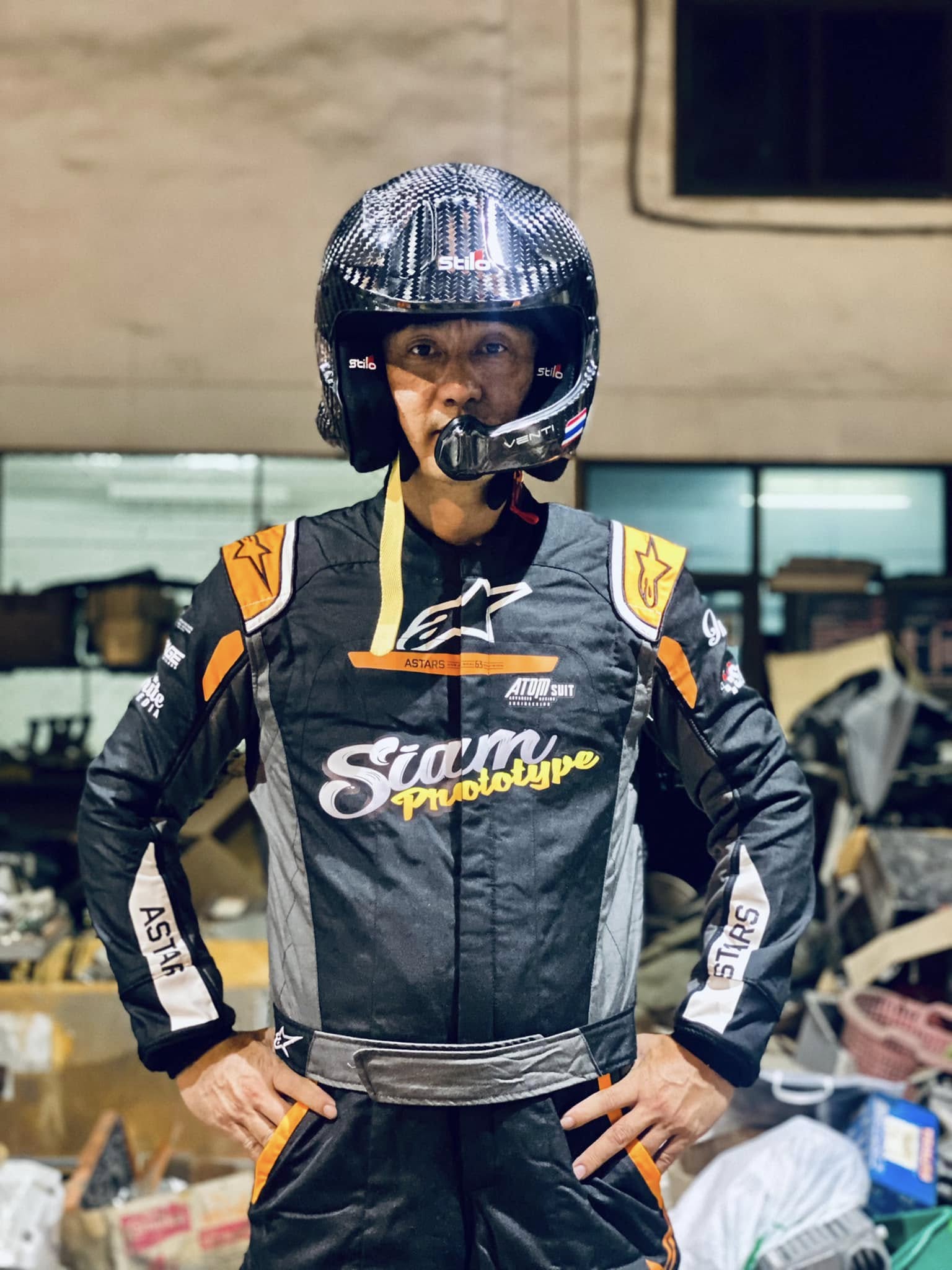Driver in Siam Prototype racing suit